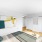 a room with a bed and two closets