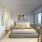 a bedroom with a large window