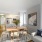 a living room with a table and chairs