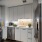 a kitchen with white cabinets