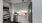 a kitchen with white cabinets