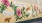 a mural with flowers and butterflies