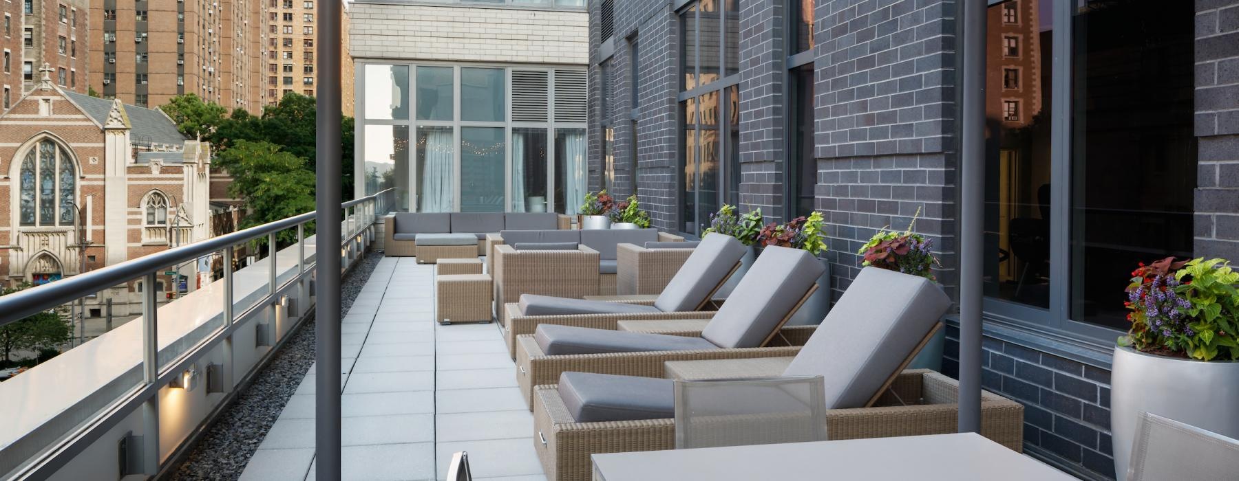 balcony with lounge chairs