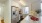 a kitchen with white cabinets