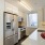 a kitchen with white cabinets