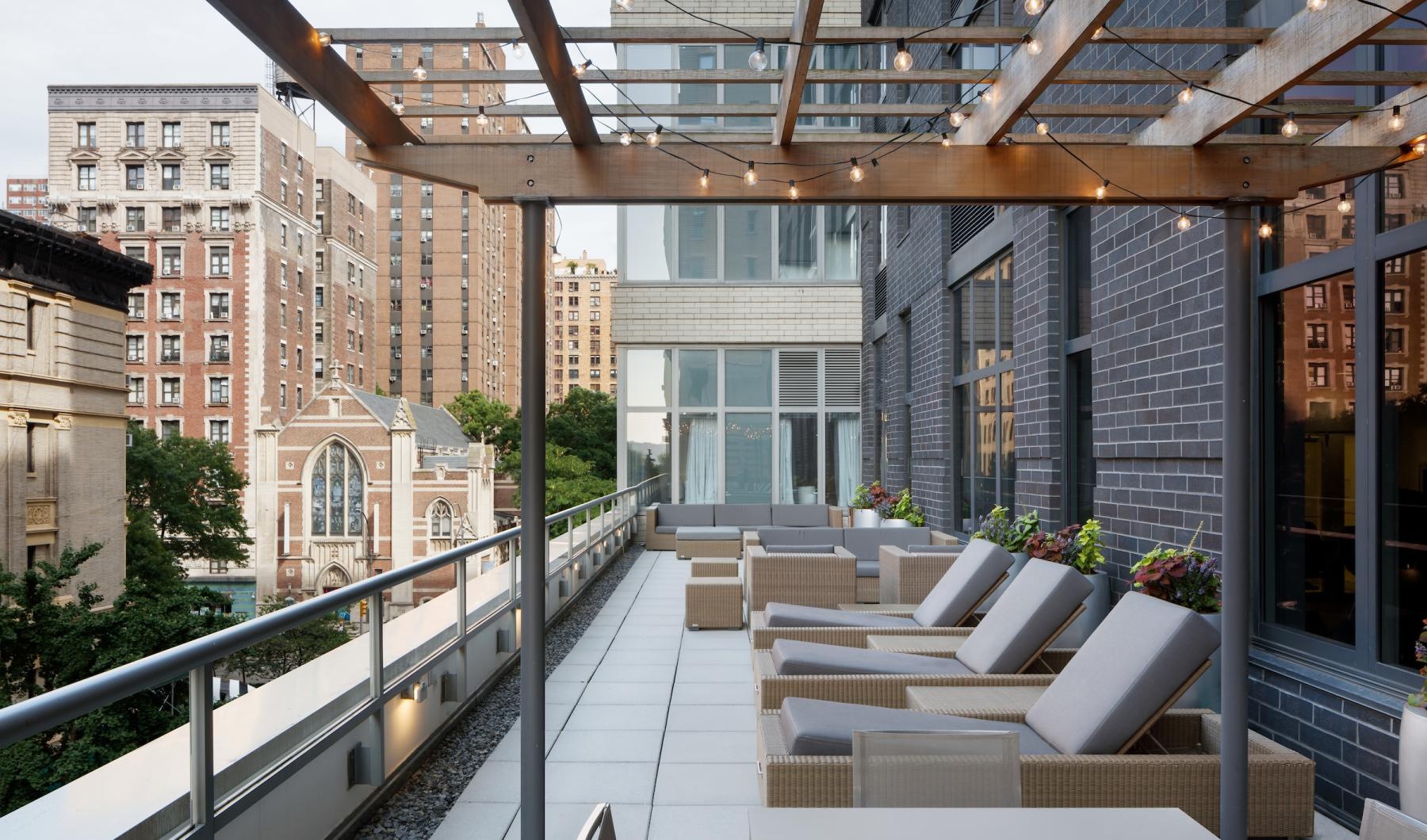 Spacious balconies balcony with lounge chairs