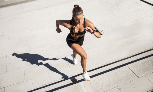 Find your perfect fit at The Melar woman running up stairs