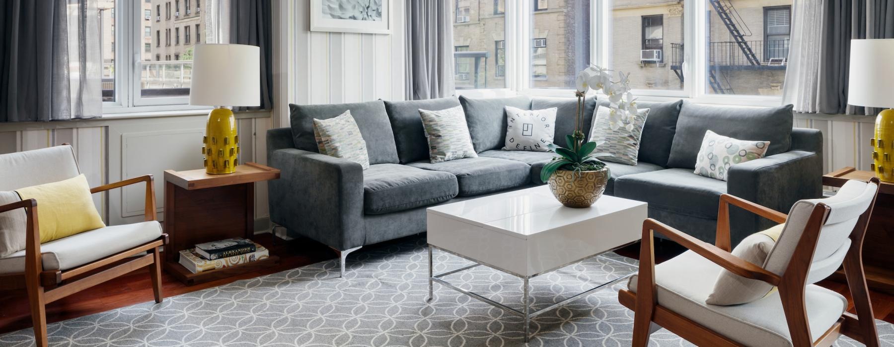 a living room with a couch and a table
