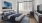 a bedroom with a large window